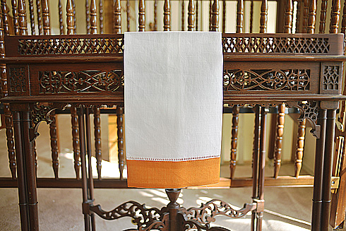 White Hemsitch Guest Towel with Autumn Blaze border. 14"x22"